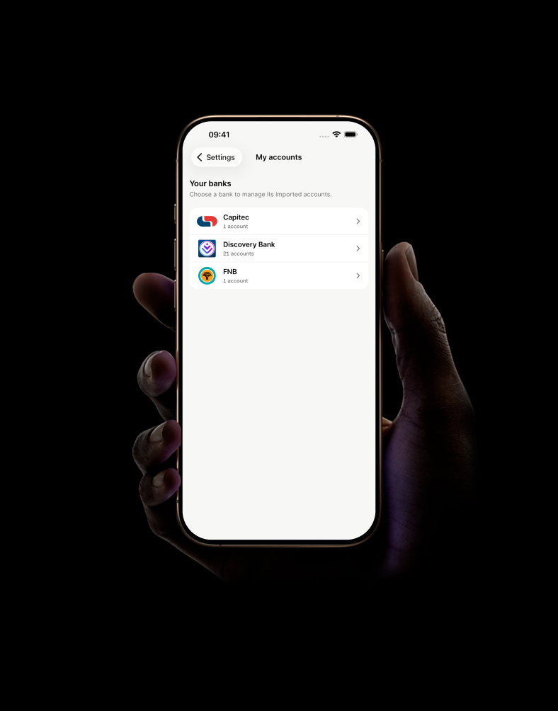 Hand holding an iPhone showing imported bank accounts in mooola