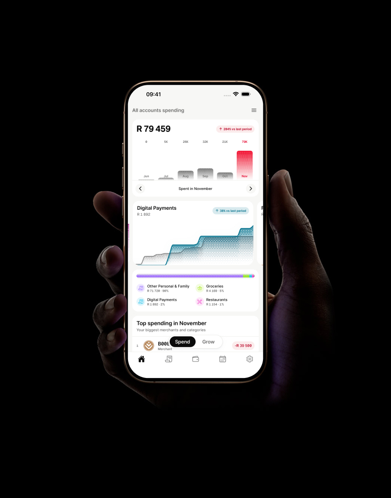 A hand holding an iPhone displaying mooola spending insights