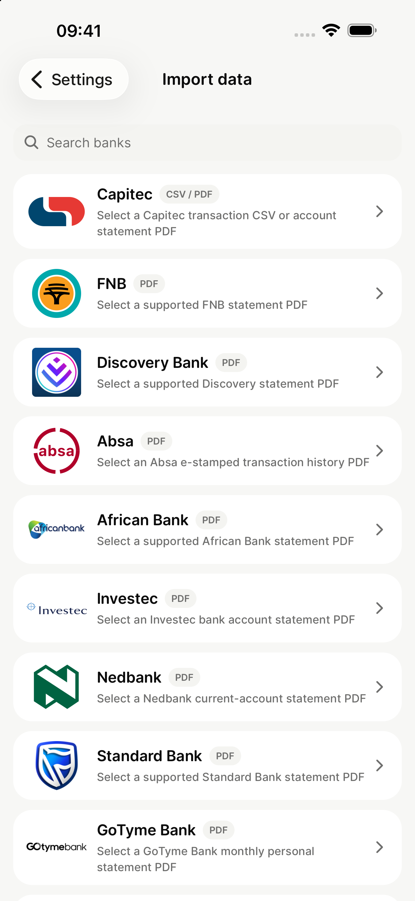mooola’s Import data screen on iPhone 17 Pro Max, listing supported banks and statement formats